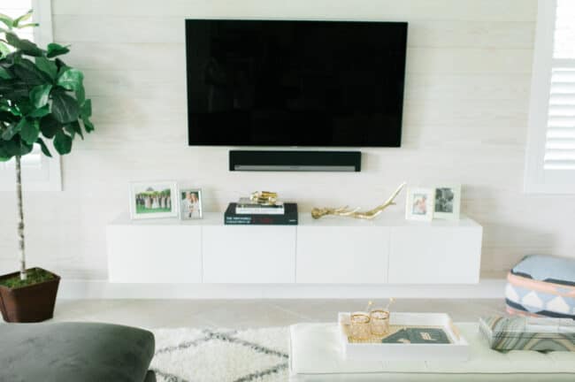 White floating media console.